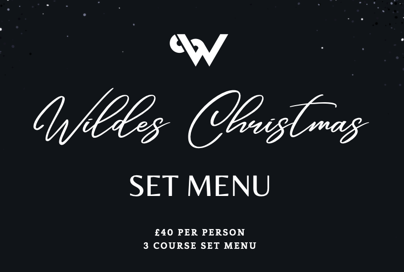 Festive dining setup at Wildes with Christmas decorations